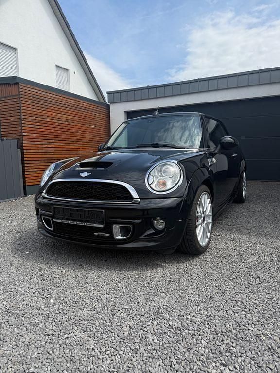 Schwarz Gebraucht 2011 Mini John Cooper Works Cabriolet Cabrio | 10.400 € (Fairer Preis) - Bild 1/4