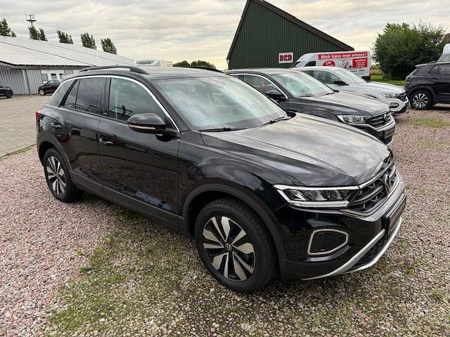 Deepblack perleffect Gebraucht 2024 VW T-Roc Style SUV | 27.880 € (Fairer Preis) - Bild 1/4