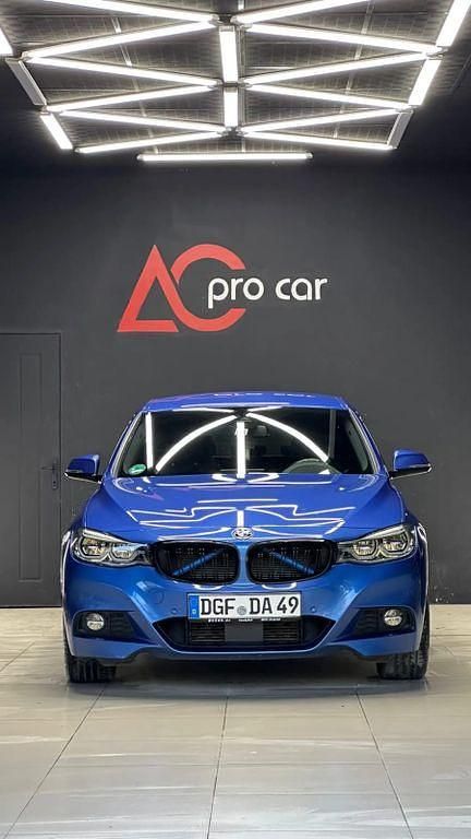 Blau Gebraucht 2018 BMW 320 Gran Turismo M Sport Limousine | 21.990 € (Fairer Preis) - Bild 1/4