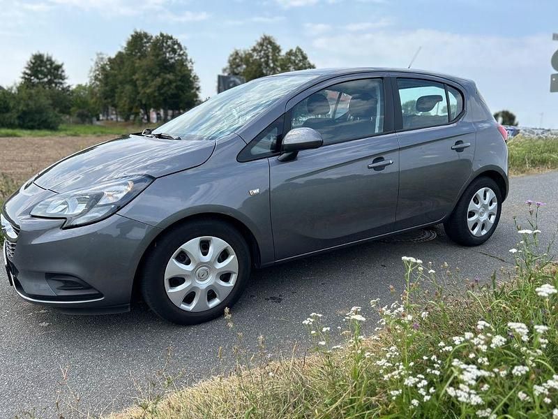 Grau Gebraucht 2015 Opel Corsa Edition Kleinwagen | 8.999 € (Guter Preis) - Bild 1/3