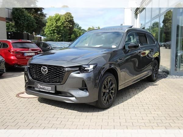 Grau (machine gray metallic) Neu 2025 Mazda CX-80 Homura-Line SUV | 54.970 € (Fairer Preis) - Bild 1/4