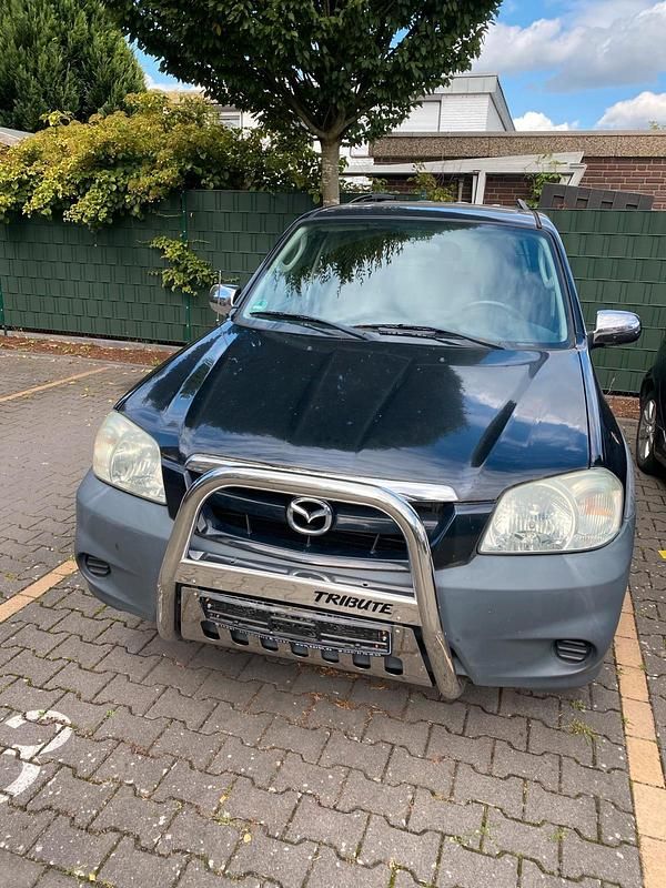 Grau Gebraucht 2004 Mazda Tribute SUV | 3.300 € - Bild 1/4