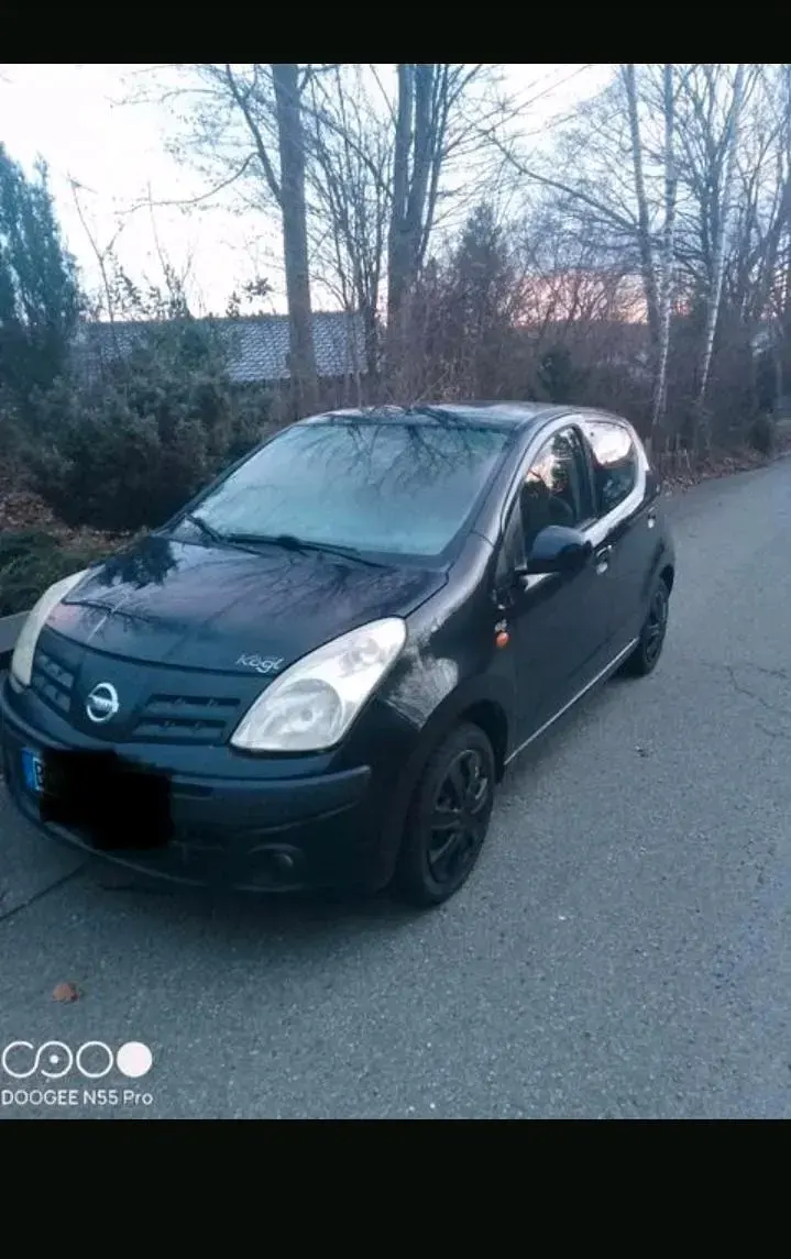 Gebraucht Nissan Pixo 68 PS (50 kW) 2010 Schwarz Kleinwagen