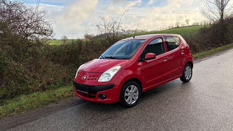 Rot Gebraucht 2012 Nissan Pixo Kleinwagen | 1.499 € (Superpreis) - Bild 1/4