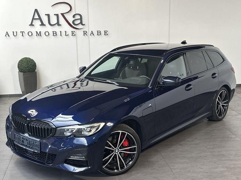 Tansanitblau ii Gebraucht 2021 BMW 330e M Sport Kombi | 28.749 € (Fairer Preis) - Bild 1/4