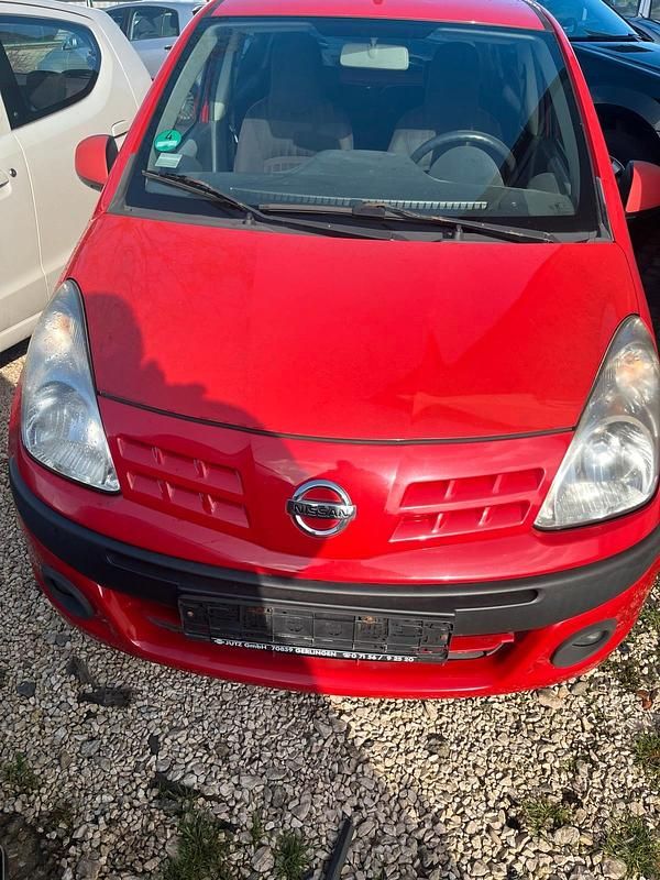 Gebraucht Nissan Pixo 68 PS (50 kW) 2009 Rot Kleinwagen
