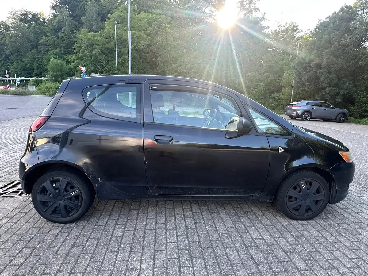 Gebraucht Mitsubishi Colt 75 PS (55 kW) 2002 Schwarz Kleinwagen