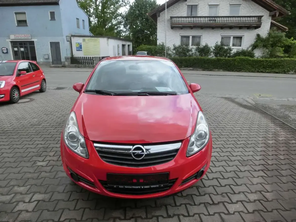 Gebraucht Opel Corsa Basis 60 PS (44 kW) 2009 Magma rot (b) Kleinwagen