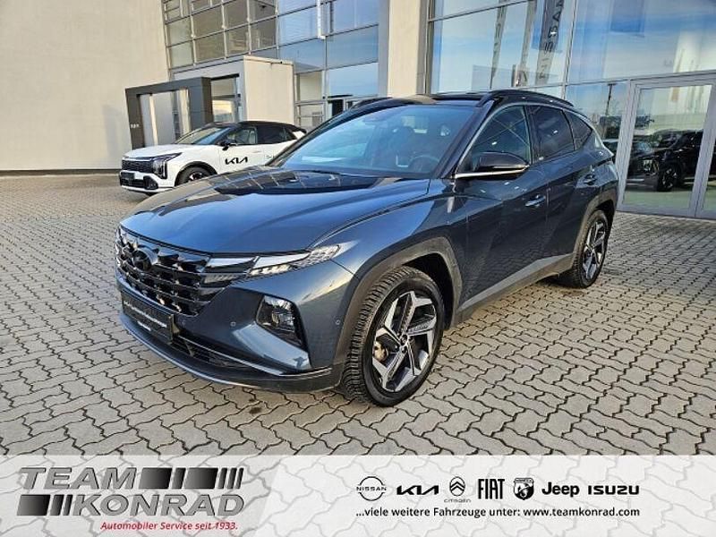 Grau Gebraucht 2021 Hyundai Tucson SUV | 28.990 € (Fairer Preis) - Bild 1/4