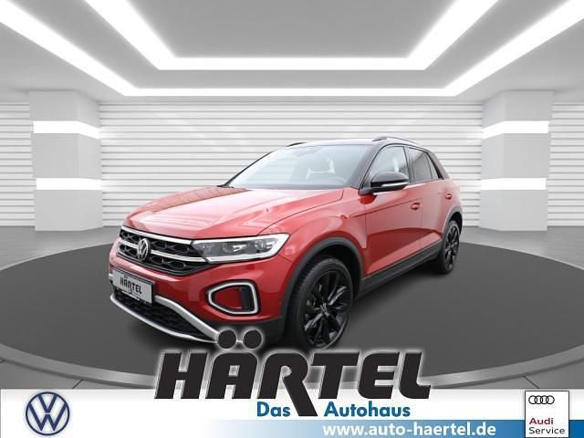 Kings red, metallic Gebraucht 2023 VW T-Roc Style SUV | 30.900 € (Fairer Preis) - Bild 1/4