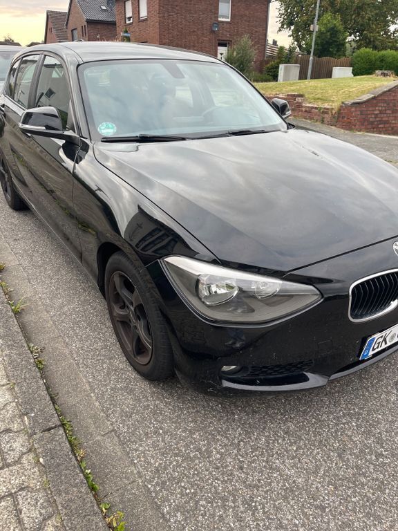 Schwarz Gebraucht 2012 BMW 116 Comfort Edition Kleinwagen | 7.400 € (Guter Preis) - Bild 1/4