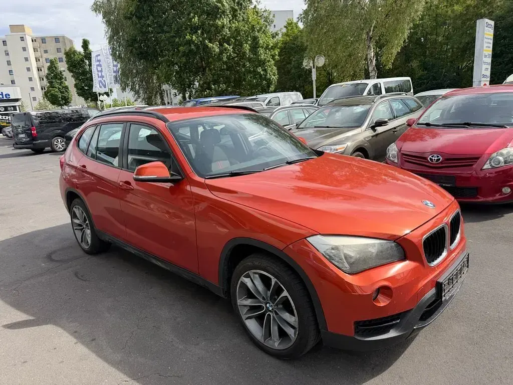Gebraucht BMW X1 Sport Line 143 PS (105 kW) 2013 Orange SUV