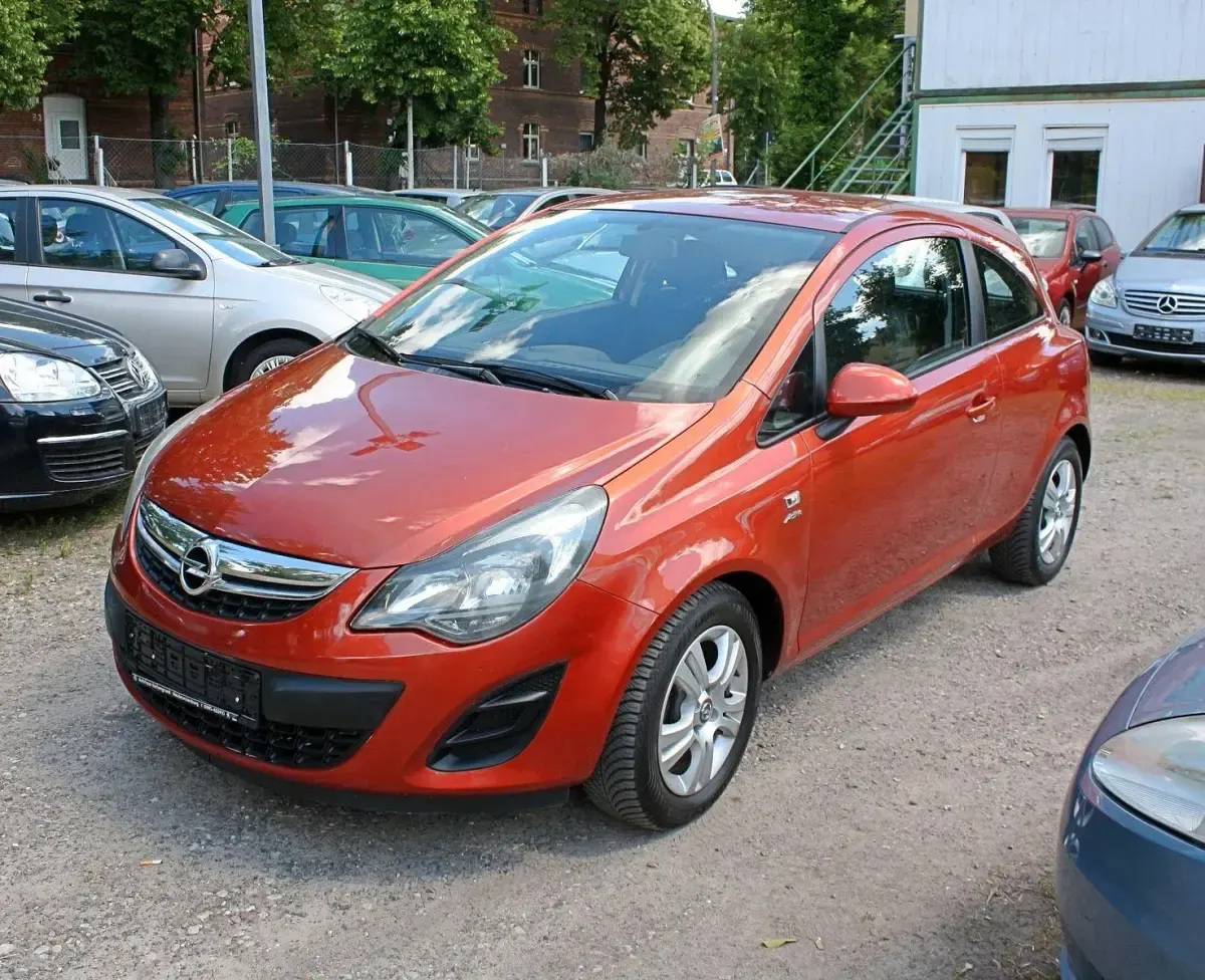 Gebraucht Opel Corsa Active 86 PS (63 kW) 2013 Orange Kleinwagen