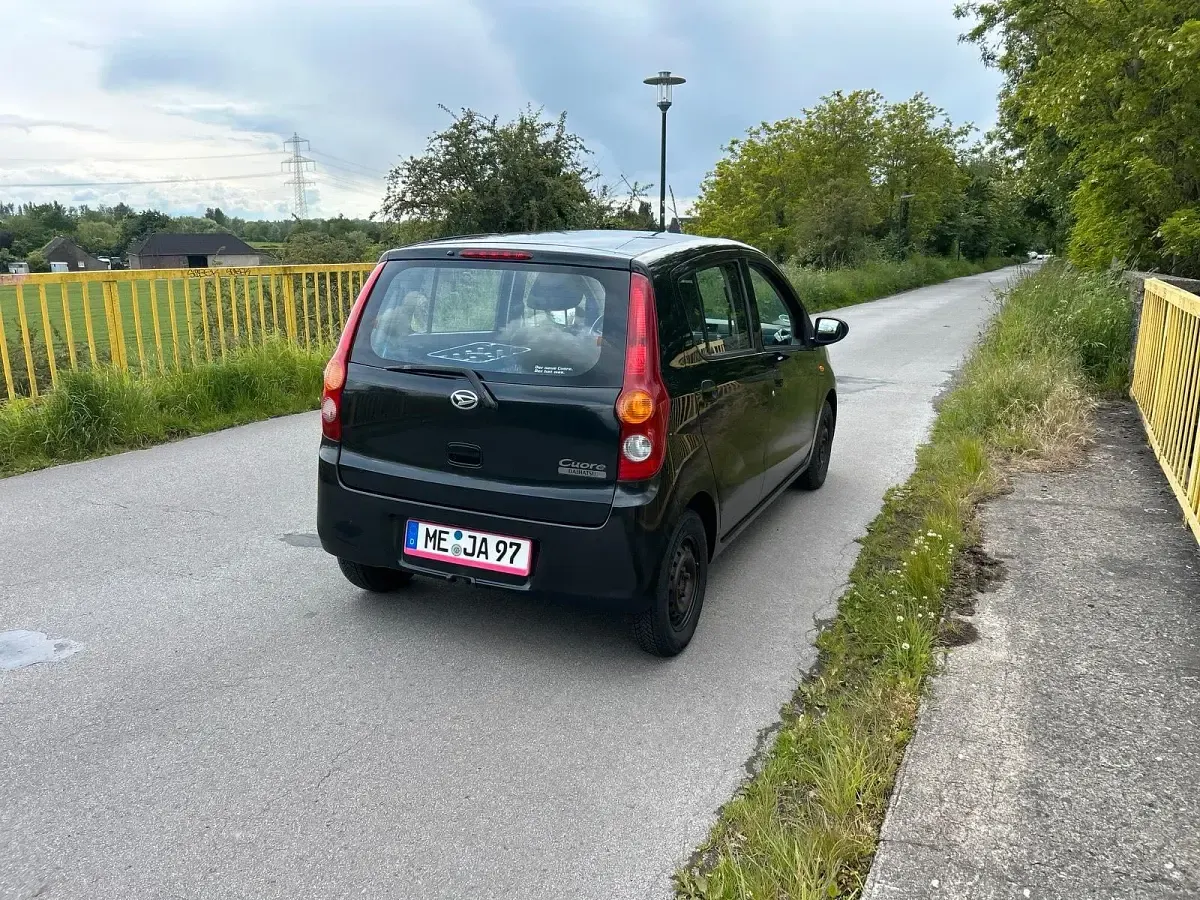 Gebraucht Daihatsu Cuore 70 PS (51 kW) 2007 Schwarz Kleinwagen