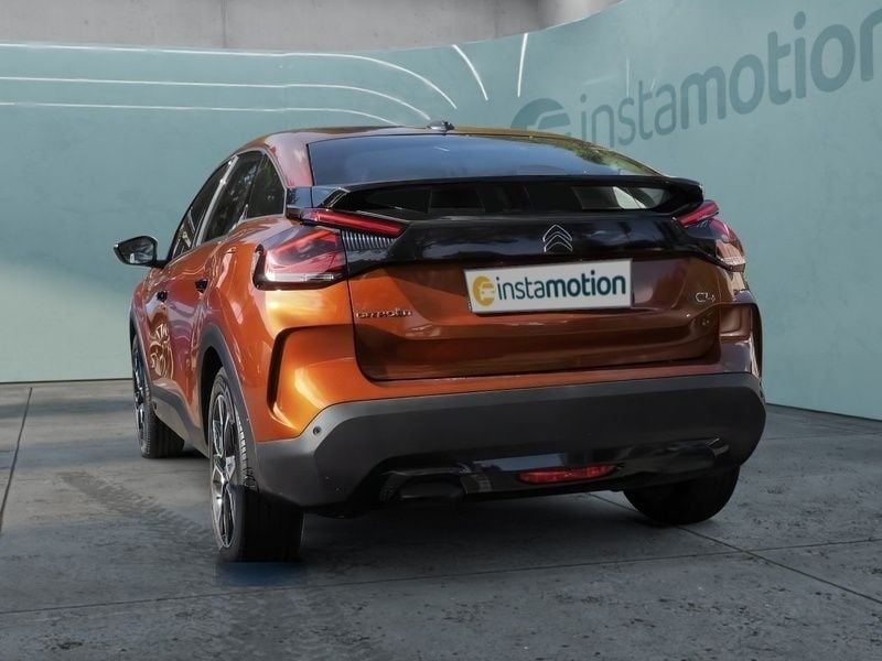 Second-hand Citroën e-C4 Feel 100 kW (136 CP) 2022 Portocaliu Berlinǎ