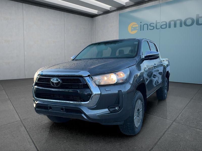 Grau Neu 2025 Toyota HiLux Comfort Abholung | 49.149 € (Teuer) - Bild 1/4