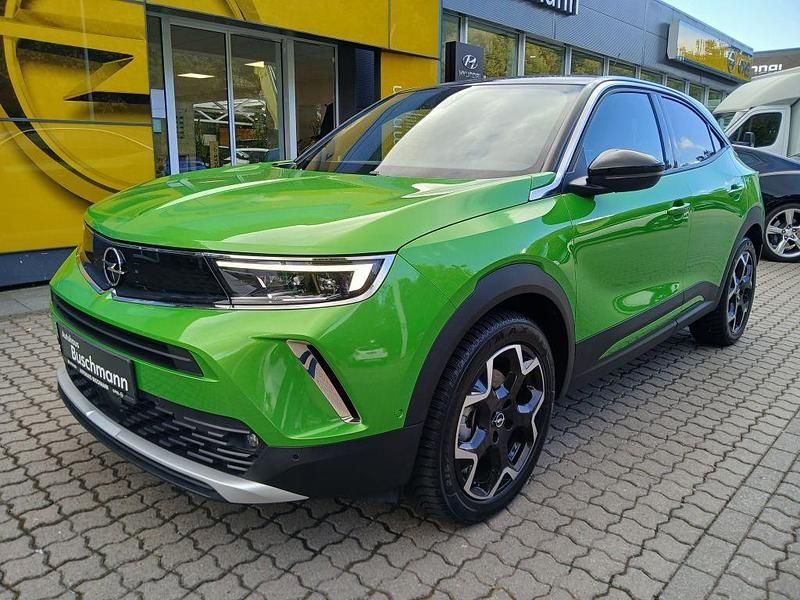 Ikone grün metallic Gebraucht 2022 Opel Mokka-e Ultimate SUV | 19.760 € (Etwas zu teuer) - Bild 1/4