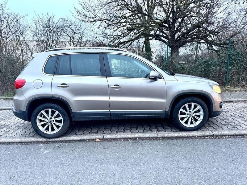 Braun Gebraucht 2014 VW Tiguan Sport SUV | 6.999 € (Superpreis) - Bild 1/4