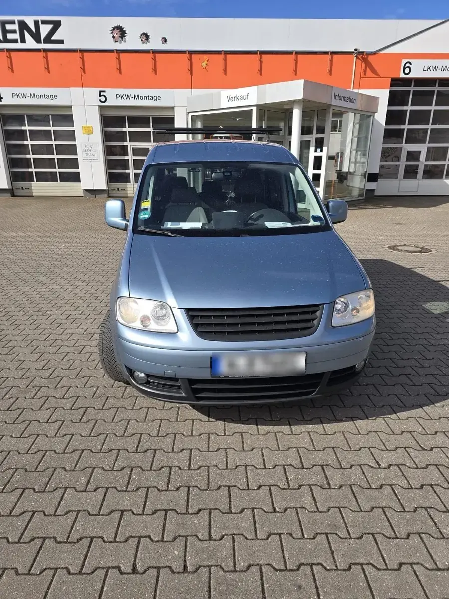Second-hand VW Caddy Style 105 CP (77 kW) 2011 Argintiu Monovolum