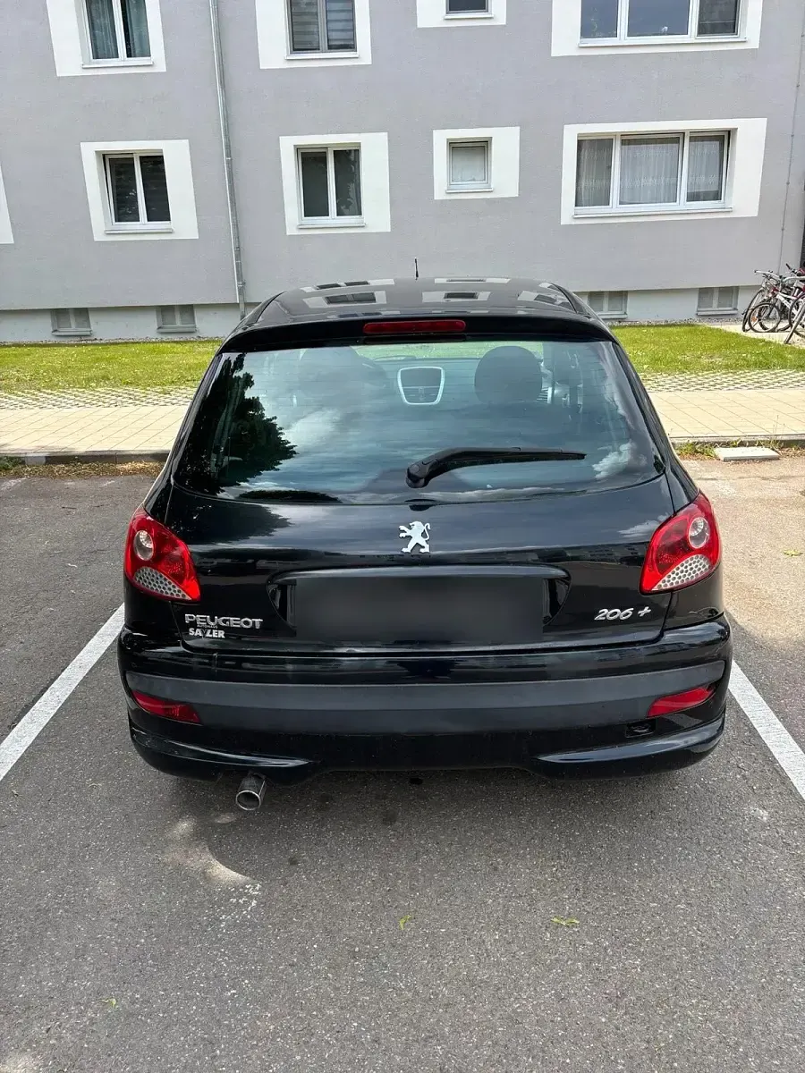 Gebraucht Peugeot 206 73 PS (53 kW) 2011 Schwarz Kleinwagen