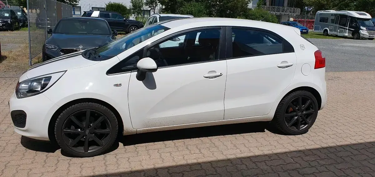 Gebraucht Kia Rio DREAM-TEAM Edition 109 PS (80 kW) 2013 Weiß Kleinwagen