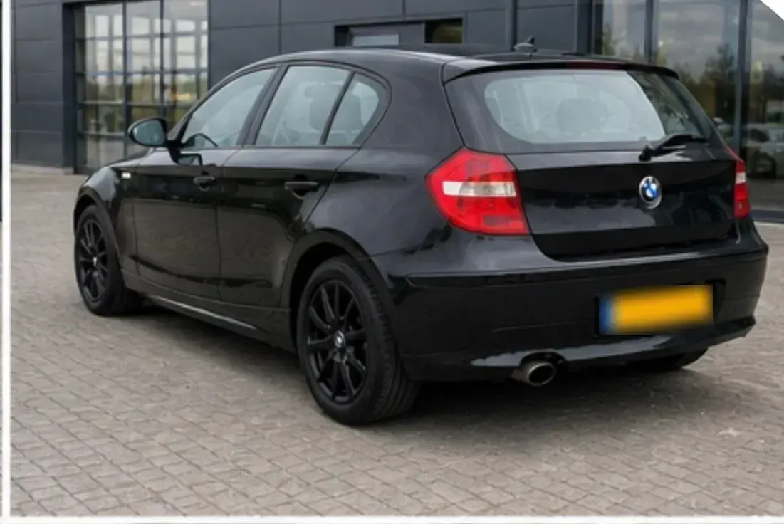 Używany BMW 116 122 KM (89 kW) 2007 Srebrny Hatchback