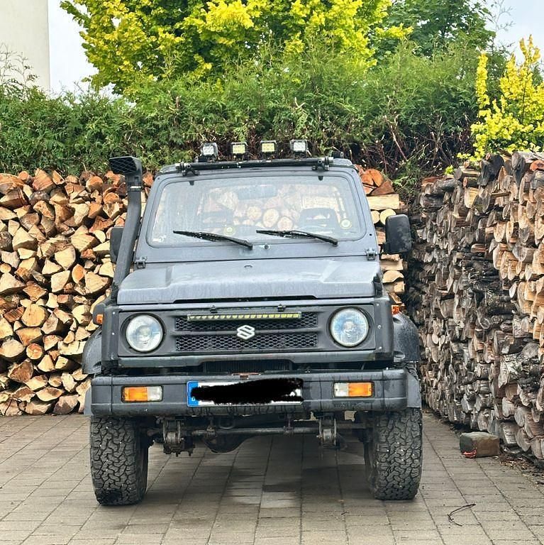 Grau Gebraucht 1998 Suzuki Samurai SUV | 6.890 € (Superpreis) - Bild 1/4