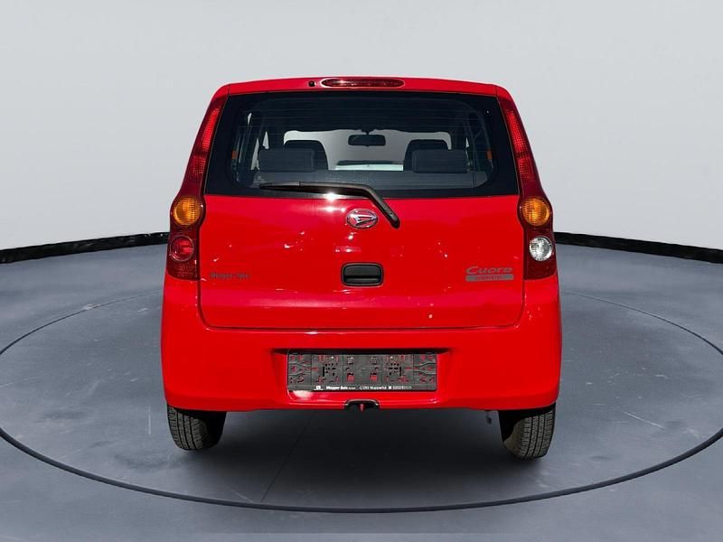 Gebraucht Daihatsu Cuore 69 PS (50 kW) 2009 Rot Kleinwagen