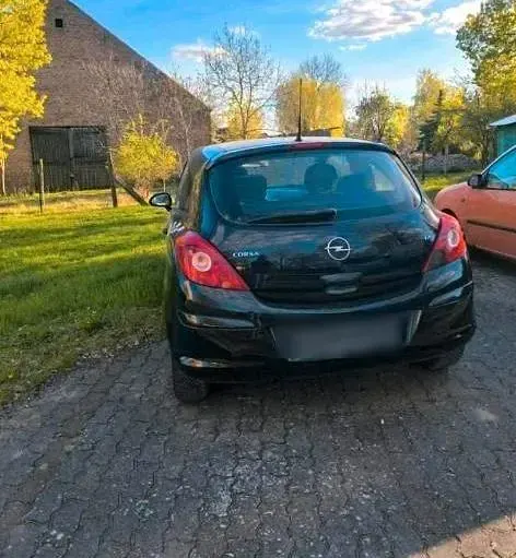 Second-hand Opel Corsa 59 CP (43 kW) 2008 Negru Hatchback