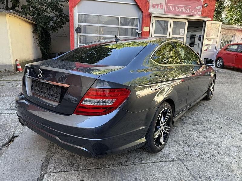 Gebraucht Mercedes C180 AMG 156 PS (114 kW) 2014 Schwarz Coupé