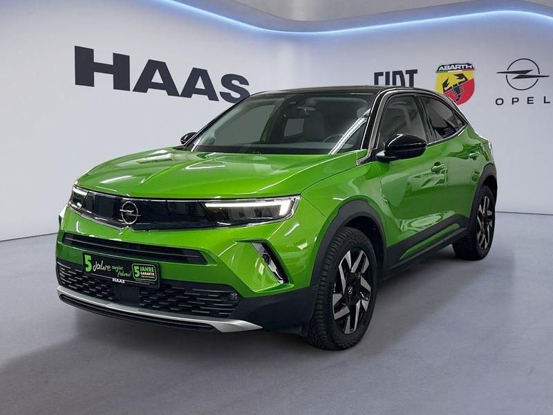 Gebraucht Opel Mokka-e Elegance 100 kW (136 PS) 2022 Matcha green/ikone gruen (metallic) SUV