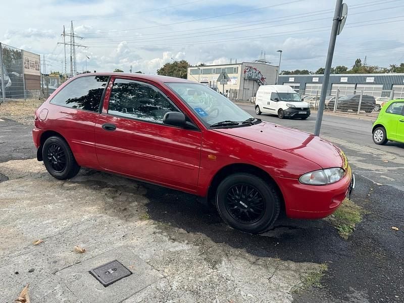 Rot Gebraucht 1996 Mitsubishi Colt Top Kleinwagen | 2.600 € - Bild 1/4