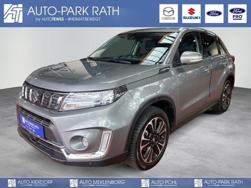 Grau Gebraucht 2023 Suzuki Vitara Comfort+ SUV | 22.980 € (Fairer Preis) - Bild 1/4