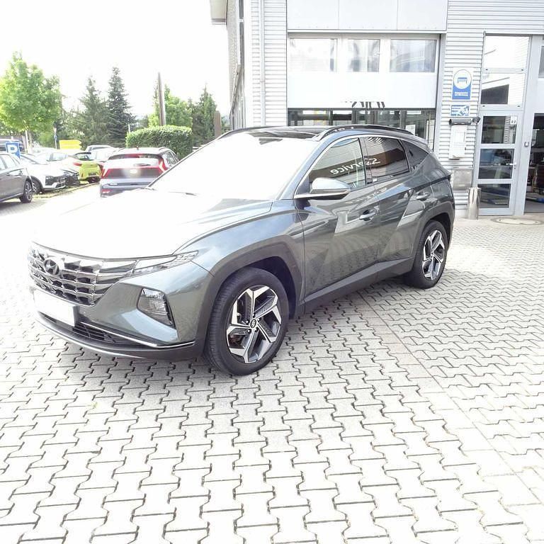 Grün Gebraucht 2021 Hyundai Tucson Trend SUV | 27.665 € (Fairer Preis) - Bild 1/4