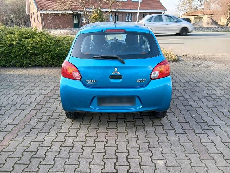 Second-hand Mitsubishi Space Star 71 CP (52 kW) 2015 Albastru Hatchback