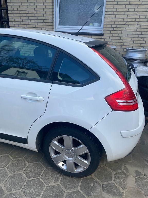 Second-hand Citroën C4 Comfort 109 CP (80 kW) 2008 Alb Berlinǎ