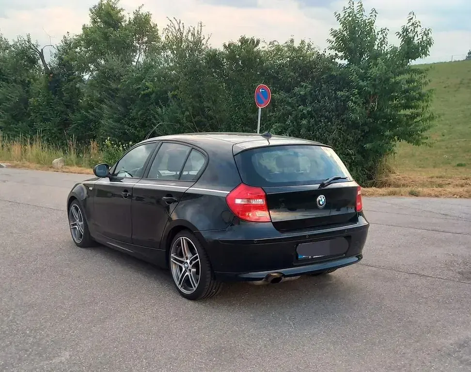 Gebraucht BMW 116 Performance 122 PS (89 kW) 2011 Schwarz Kleinwagen