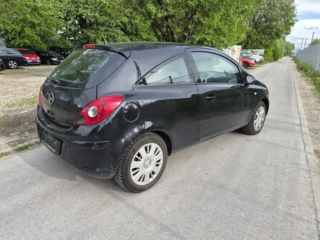 Używany Opel Corsa Edition 80 KM (58 kW) 2009 Czarny Hatchback