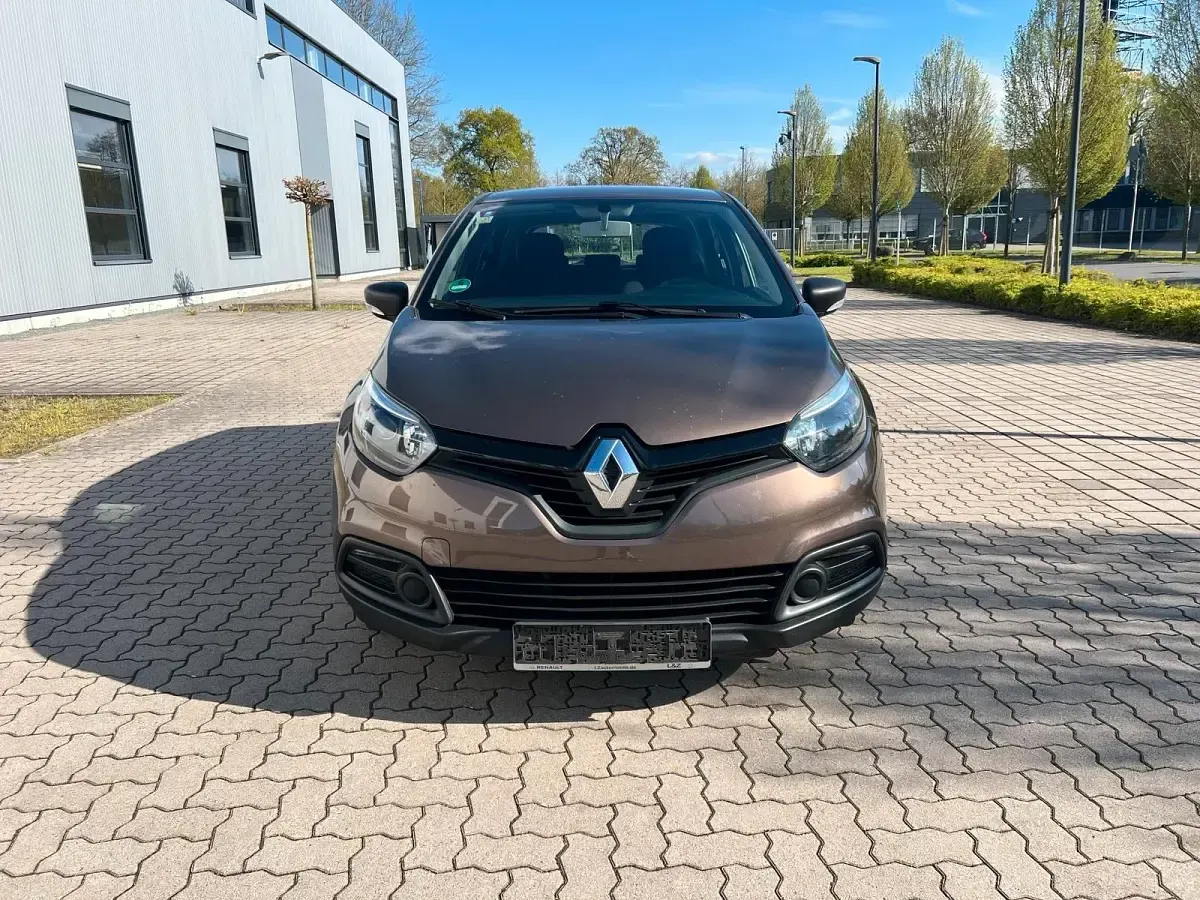 Używany Renault Captur 90 KM (66 kW) 2013 Brązowy SUV