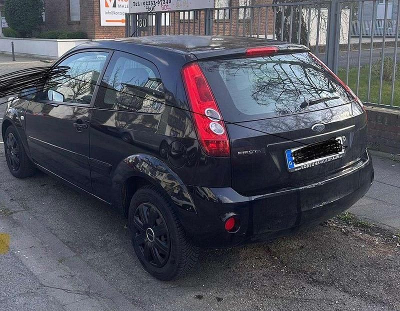 Gebraucht Ford Fiesta Ambiente 69 PS (50 kW) 2008 Schwarz Kleinwagen