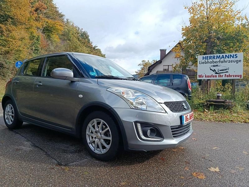 Grau Gebraucht 2015 Suzuki Swift Club Kleinwagen | 6.500 € (Fairer Preis) - Bild 1/4