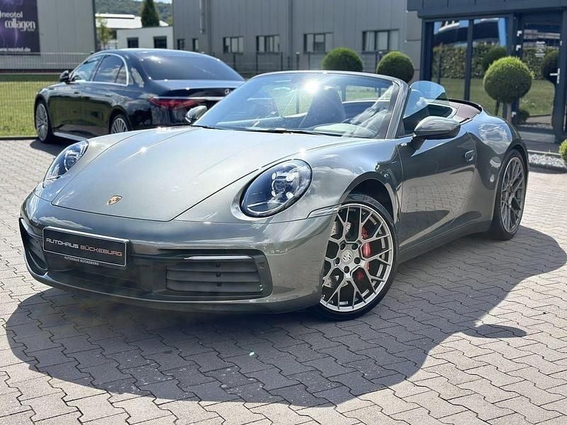 Aventuringrünmetallic Gebraucht 2021 Porsche 911 Cabrio | 124.900 € (Guter Preis) - Bild 1/4