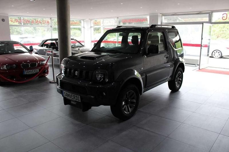 Grau Gebraucht 2016 Suzuki Jimny Style SUV | 11.990 € (Superpreis) - Bild 1/4