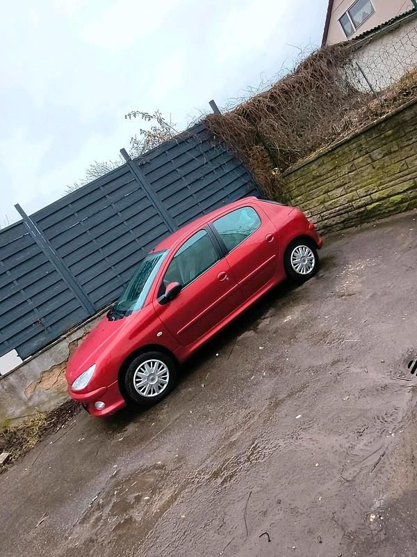 Gebraucht Peugeot 206 75 PS (55 kW) 2009 Rot Kleinwagen