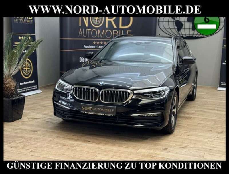 Black sapphire metallic Gebraucht 2020 BMW 520 Performance Kombi | 25.990 € (Guter Preis) - Bild 1/3