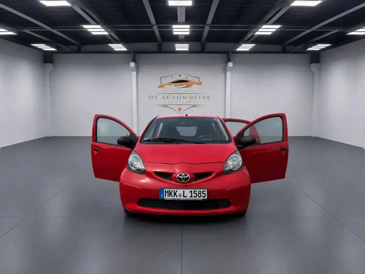 Gebraucht Toyota Aygo 68 PS (50 kW) 2007 Rot Kleinwagen