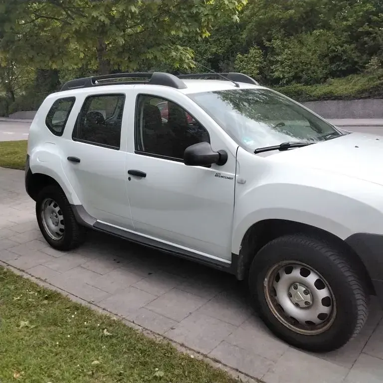 Używany Dacia Duster Lauréate 105 KM (77 kW) 2013 Biały SUV