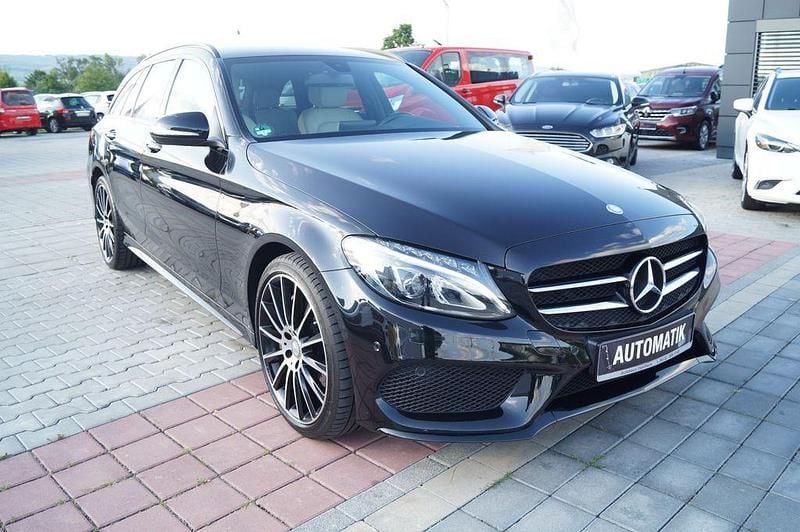 Obsidianschwarz Gebraucht 2015 Mercedes C400 AMG line Kombi | 26.890 € (Fairer Preis) - Bild 1/4