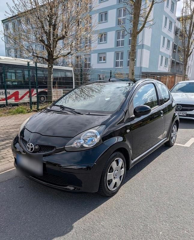 Gebraucht Toyota Aygo 68 PS (50 kW) 2007 Schwarz Kleinwagen
