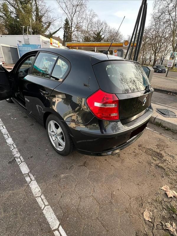 Second-hand BMW 116 122 CP (89 kW) 2007 Negru Hatchback